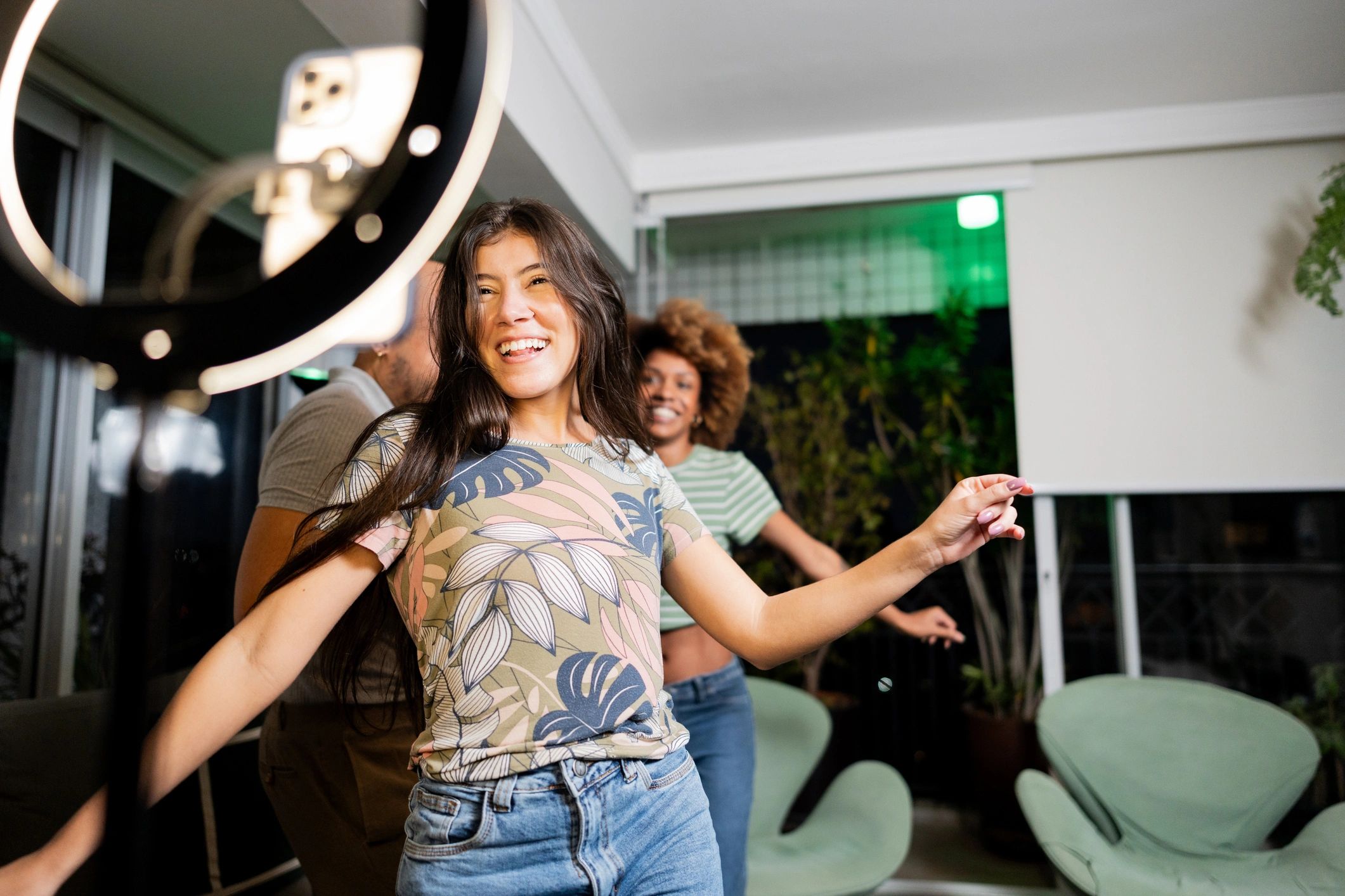 Content creator filming a social media video with friends